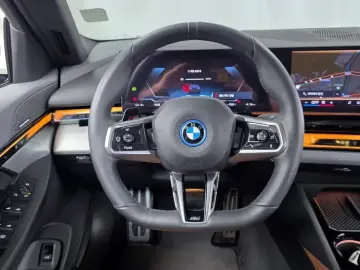 2024 BMW i5 с пробегом 67 428 км