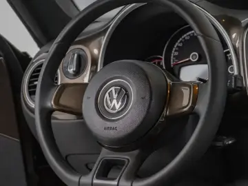 2014 Volkswagen Beetle с пробегом 87 000 км